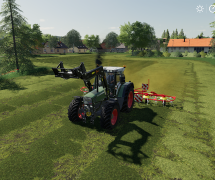 Heu wenden mit einem Fendt Farmer 312