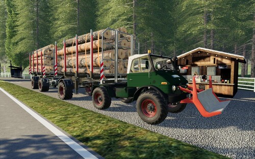 Unimog_406_mit_Fliegl_Wood_Trailer