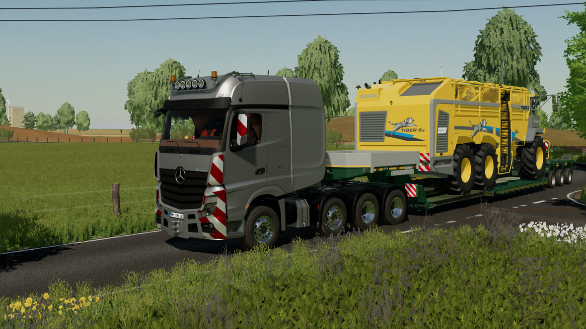 Actros 4163 SLT mit Goldhofer Tiefbett und Ropa Tiger 6S