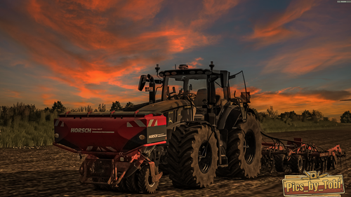 Drillen im Sonnenuntergang mit einen John  Derre 6R250